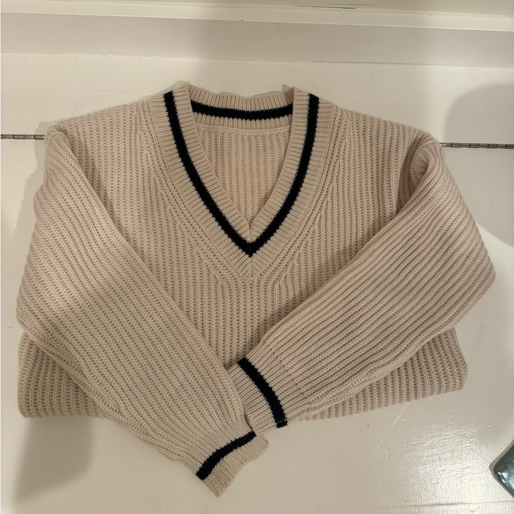 Tan and navy v-neck cozy sweater